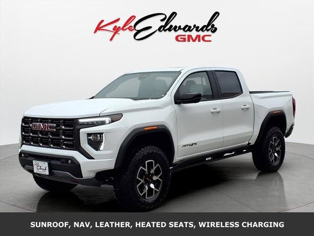 2026 GMC Canyon AT4X in Summit White — front three-quarter view